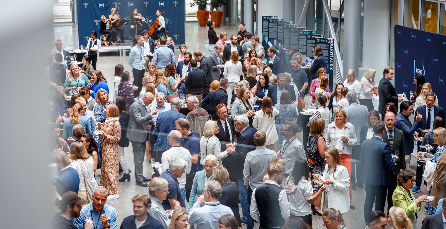 Crowd of people drinking and eating